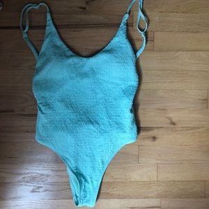 Baby blue open back ruffle one piece